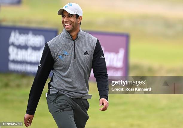 Aaron Rai of England smiles as he leaves the 18th green during the final round of the Aberdeen Standard Investments Scottish Open at The Renaissance...