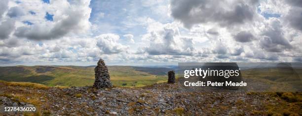 panorama of cairns on wild boar fell - wild boar fell stock pictures, royalty-free photos & images