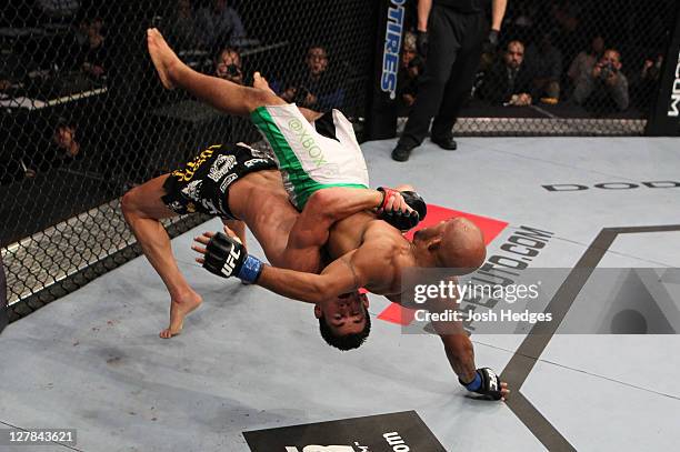 Dominick Cruz suplexes Demetrious Johnson during the UFC on Versus event at the Verizon Center on October 1, 2011 in Washington, DC.