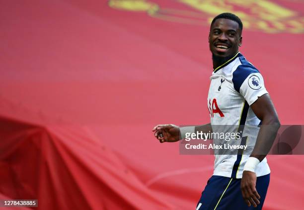 Serge Aurier of Tottenham Hotspur celebrates after scoring his sides fifth goal during the Premier League match between Manchester United and...