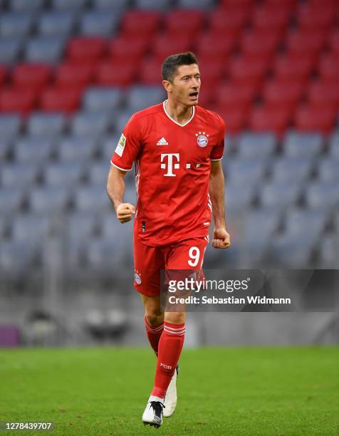Robert Lewandowski of Bayern Munich celebrates after scoring his team's first goal during the Bundesliga match between FC Bayern Muenchen and Hertha...