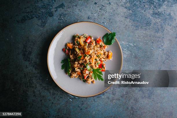 spicy rice with meat and vegetables - healthy rice bowl stock pictures, royalty-free photos & images