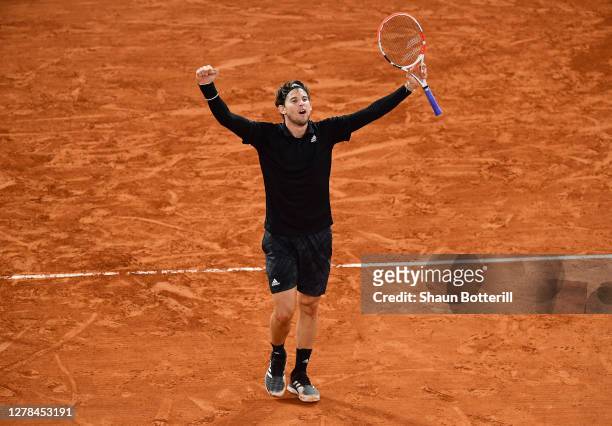 Dominic Thiem of Austria celebrates after winning match point during his Men's Singles fourth round match against Hugo Gaston of France on day eight...