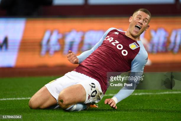 Ross Barkley of Aston Villa celebrates after he scores his team's fifth goal during the Premier League match between Aston Villa and Liverpool at...