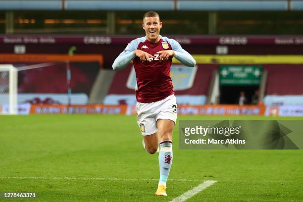 Ross Barkley of Aston Villa celebrates after scoring his team's fifth goal during the Premier League match between Aston Villa and Liverpool at Villa...