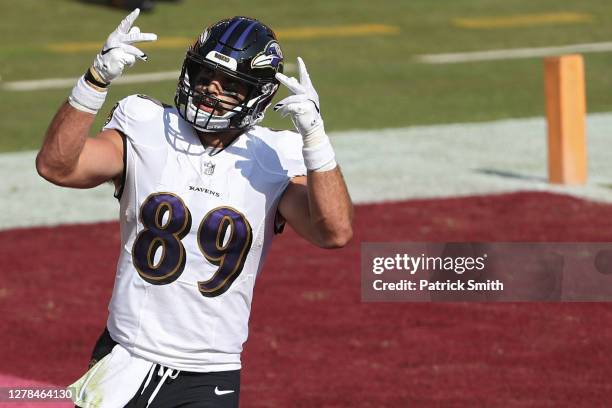 Tight end Mark Andrews of the Baltimore Ravens celebrates his second touchdown of the game against the Washington Football Team during the third...