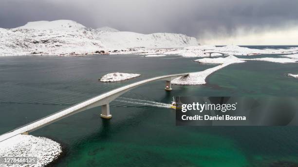 the famous fredvang bridges on the lofoten islands during winter and seen from the air - atlantic road norway stock-fotos und bilder