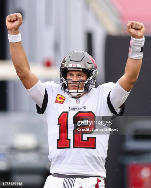 Tom Brady of the Tampa Bay Buccaneers celebrates after defeating the Los Angeles Chargers after a game at Raymond James Stadium on October 04, 2020...