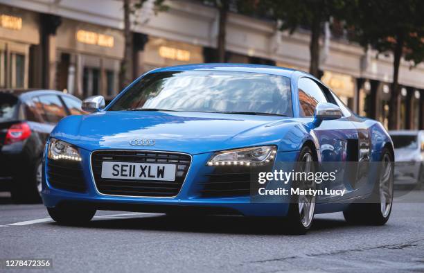 The Audi R8 on Sloane street in Knightsbridge, London. The R8 is Audi's two seater supercar, aimed at a market to contest with the likes of BMW m8,...