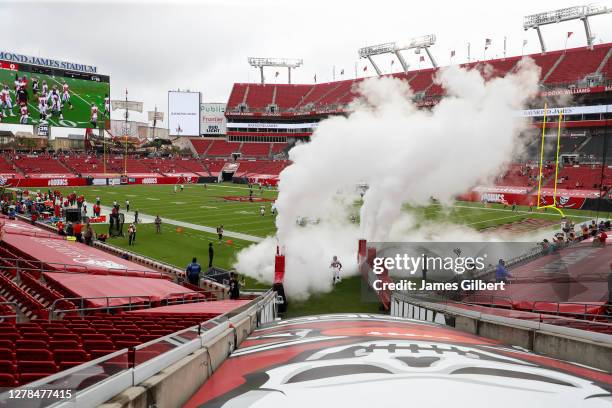 Ronald Jones of the Tampa Bay Buccaneers enters the field before the start of a game against the Los Angeles Chargers at Raymond James Stadium on...