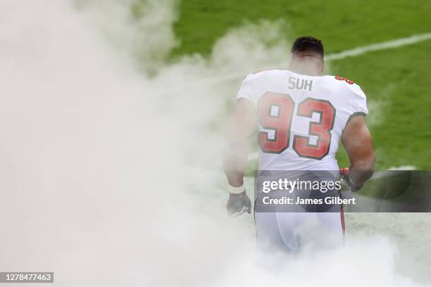 Ndamukong Suh of the Tampa Bay Buccaneers enters the field before the start of a game against the Los Angeles Chargers at Raymond James Stadium on...