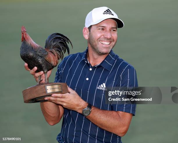 Sergio Garcia of Spain celebrates with the trophy after winning the Sanderson Farms Championship at The Country Club of Jackson on October 04, 2020...