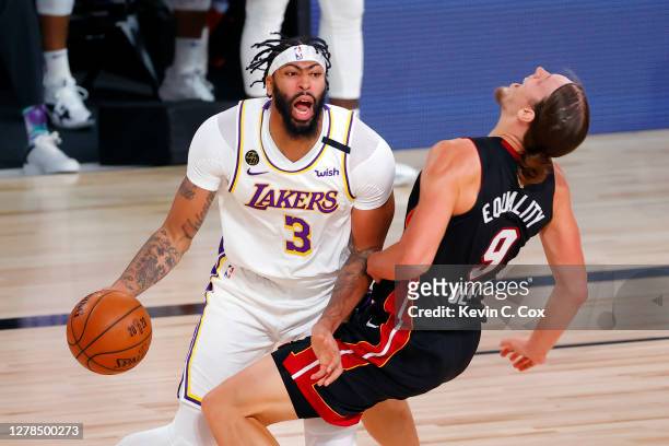 Anthony Davis of the Los Angeles Lakers is called for a foul against Kelly Olynyk of the Miami Heat during the first half in Game Three of the 2020...