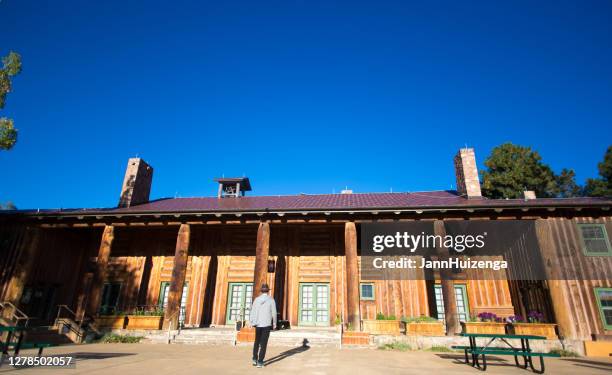 los alamos, nm: man approaching fuller lodge entrance - los alamos new mexico stock pictures, royalty-free photos & images
