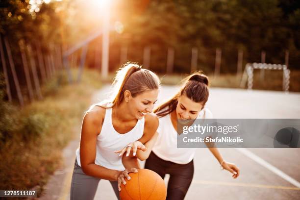 we are friends - women's basketball stock pictures, royalty-free photos & images