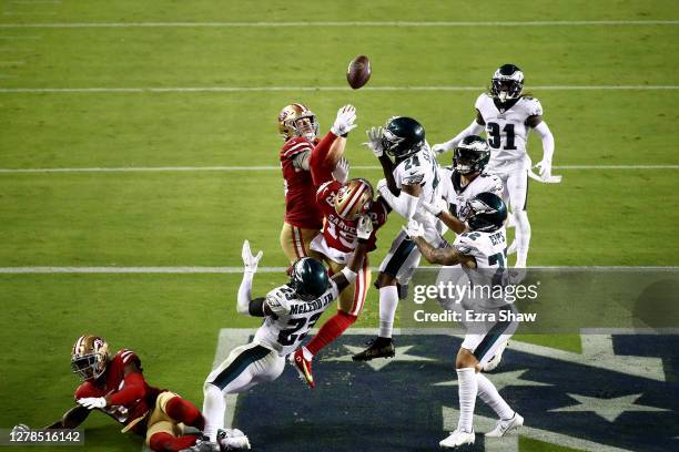 George Kittle and Deebo Samuel of the San Francisco 49ers fail to make a catch in the end zone at the end of the game against Darius Slay Marcus Epps...