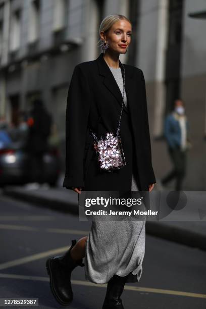 Leonie Hanne is seen wearing a total Paco Rabanne look and Bottega Veneta boots outside Paco Rabanne during Paris Fashion Week - Womenswear Spring...