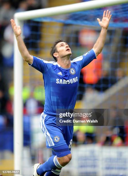 Frank Lampard of Chelsea celebrates scoring his team's second goal during the Barclays Premier League match between Bolton Wanderers and Chelsea at...