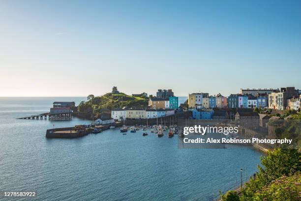 view of tenby town and carmarthen bay in pembrokeshire, wales - wales coast stock pictures, royalty-free photos & images