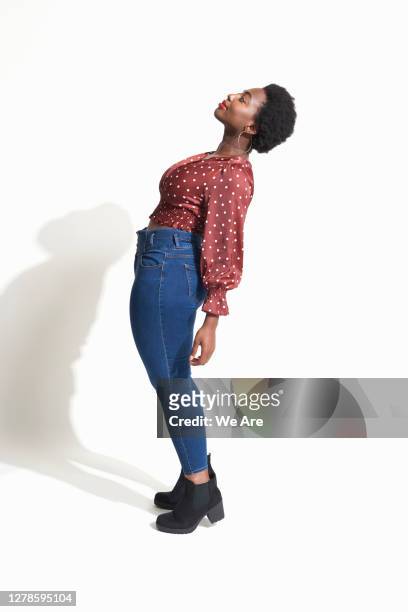 woman bending backwards - bending over backwards stock pictures, royalty-free photos & images