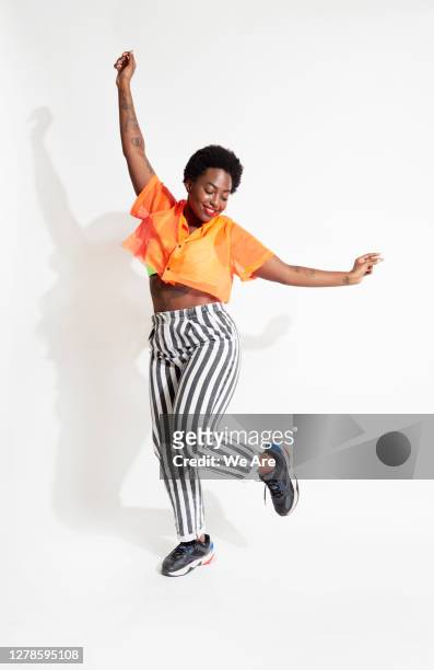 woman dancing - dancing white background stock pictures, royalty-free photos & images