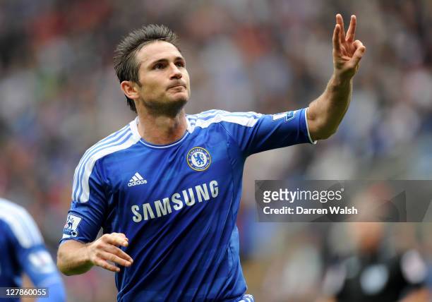 Frank Lampard of Chelsea celebrates scoring his team's fifth goal and his hat trick during the Barclays Premier League match between Bolton Wanderers...