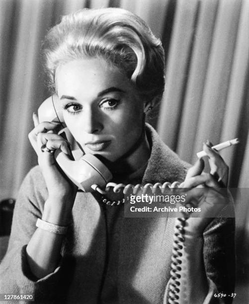 Tippi Hedren receives phone call in a scene from the film 'The Birds', 1963.