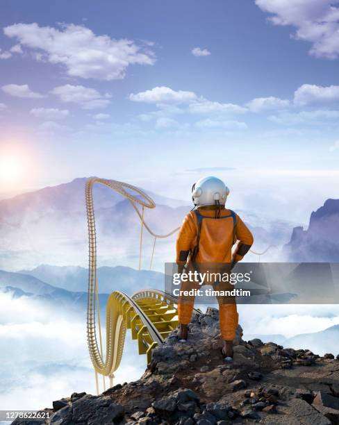 astronaut forecasting uncertainty - anticipation rollercoaster stock pictures, royalty-free photos & images