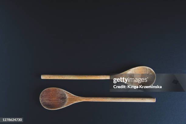 two wooden spoons - träsked bildbanksfoton och bilder