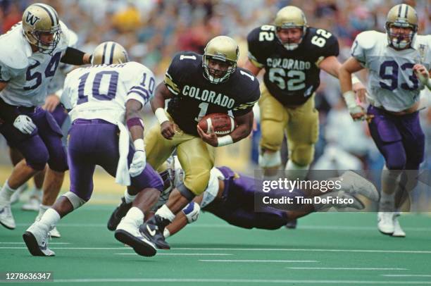 Eric Bieniemy, Running Back for the University of Colorado Buffaloes runs the football downfield during the NCAA Pac -10 college football game...