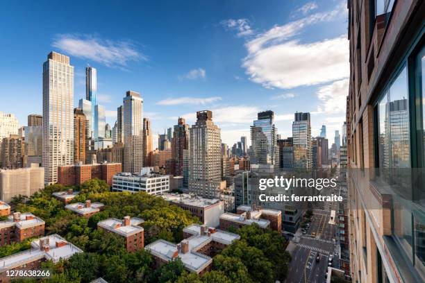 matching day and night new york skyline - day and night image series stock pictures, royalty-free photos & images