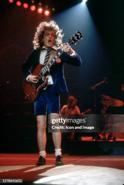 Angus Young, the Australian musician, best known as the co-founder, lead guitarist, and songwriter of the Australian hard rock band AC/DC, onstage at...