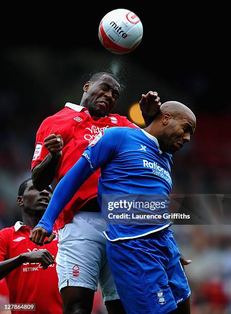 Wes Morgan of Nottingham Forest battles with Marlon King of Birmingham City during the npower Championship match between Nottingham Forest and...