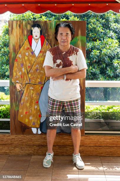 Japanese Designer Kenzo Takada poses in his Monaco flat on June 29, 2012 in Monaco, Monaco.