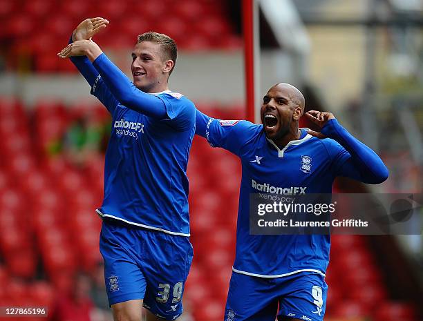 Chris Wood of Birmingham City celebrates the second goal with Marlon King during the npower Championship match between Nottingham Forest and...