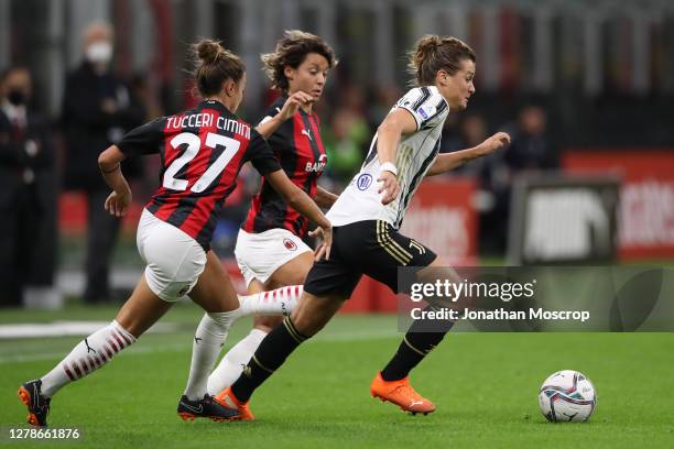 Cristiana Girelli of Juventus takes on AC Milan's Valentina Giacinti and Linda Tucceri Cimini during the Women's Serie A match between AC Milan and...