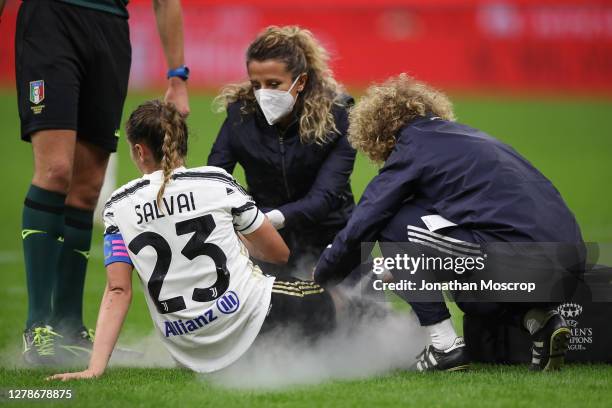 Cecilia Salvai of Juventus receives treatment after taking a knock to the knee during the Women's Serie A match between AC Milan and Juventus at...