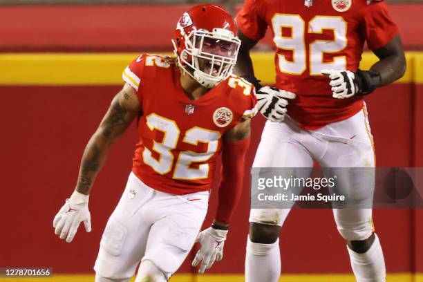 Tyrann Mathieu of the Kansas City Chiefs celebrates after scoring a pick six in theh fourth quarter against the New England Patriots at Arrowhead...