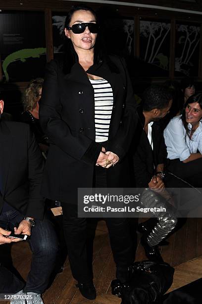 Beatrice Dalle attends the John Galliano Ready to Wear Spring / Summer 2012 show during Paris Fashion Week on October 2, 2011 in Paris, France.