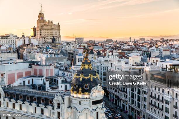 madrid skyline and metropolis building at sunset, spain - gran vía madrid foto e immagini stock