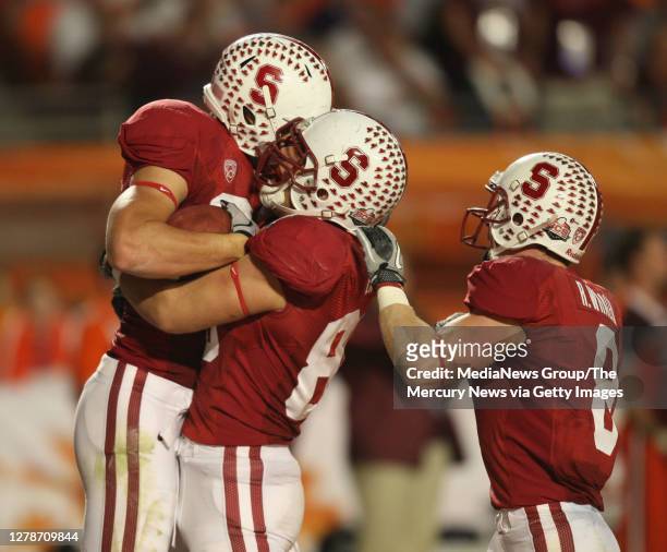 Stanford University"u2019s Coby Fleener, left, celebrates his touchdown against the Virginia Tech Hokies with Zach Ertz in the fourth quarter of the...