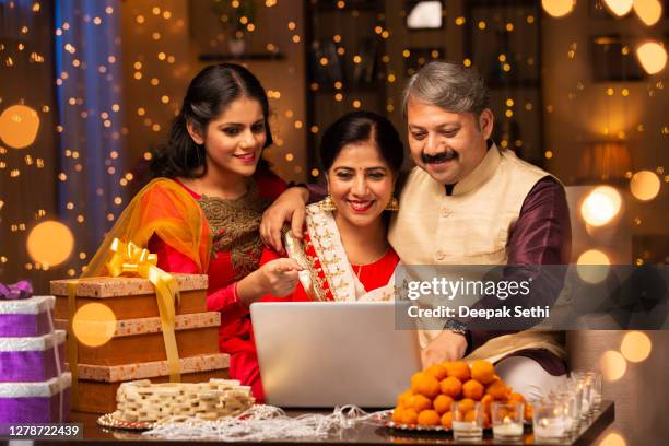 family diwali celebrate - stock photo - india celebrates diwali festival stock pictures, royalty-free photos & images