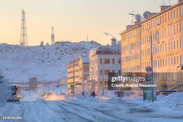 snow-covered street of the northern city in the arctic - northeastern siberia stock pictures, royalty-free photos & images