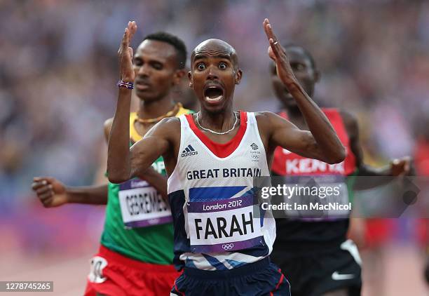 Mo Farah of Great Britain celebrates victory in the men's 5000m Final during the 2012 London Olympics at The Olympic Stadium on August 11, 2012 in...