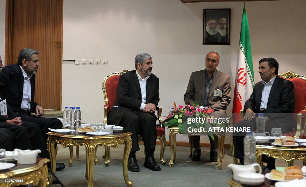 Iran's President Mahmoud Ahmadinejad (R)