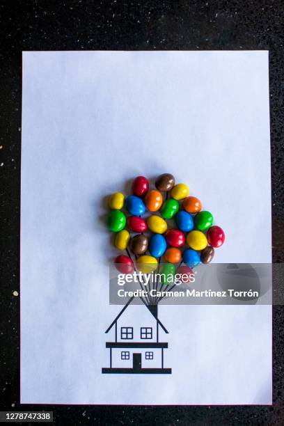 the little flying house. - burst pipes stock pictures, royalty-free photos & images