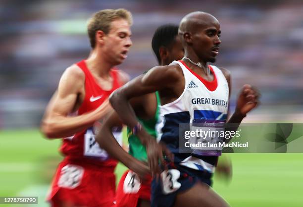 Mo Farah of Great Britain and Galen Rupp of United States compete in the men's 5000m Final during the 2012 London Olympics at The Olympic Stadium on...