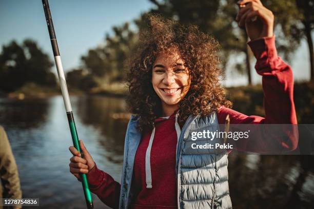 Tposing Fish 158,412 People Fishing Stock Photos, High-Res Pictures, and Images ...