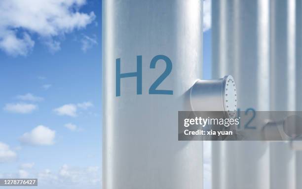 hydrogen pipeline with blue sky background - wasserstoff-brennstoffzelle stock-fotos und bilder