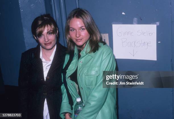 Singer Jewel on right poses for a portrait at the Gimme Shelter benefit concert at the Palace Theatre in Los Angeles, California on November 20, 1995.